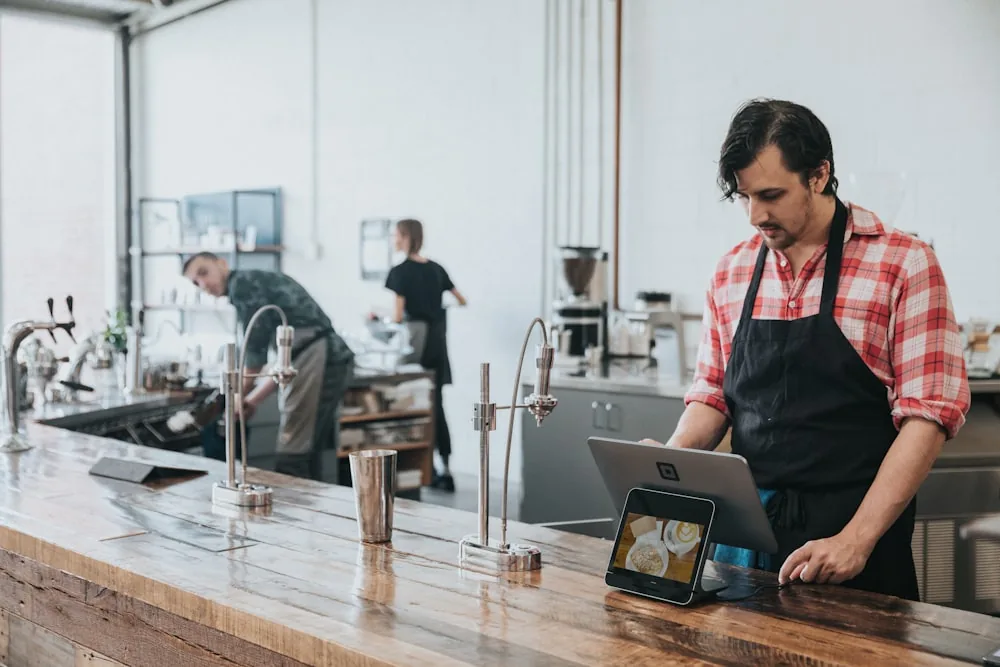 Small business owner reviewing general liability policy